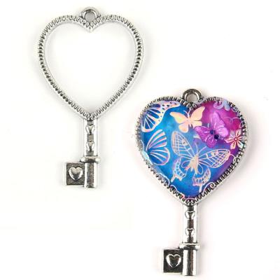 Charm Bezel - Chiave cuore - Colore: Argento