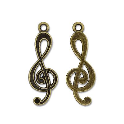4 Charm bronzo chiave di violino