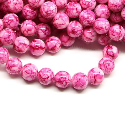 1 filo di perle marmorizzate da 12mm - colore: BIANCO FUCSIA