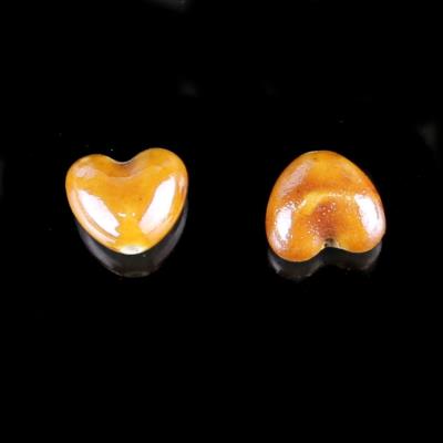 2 Perle a cuore in porcellana - colore: MARRONE